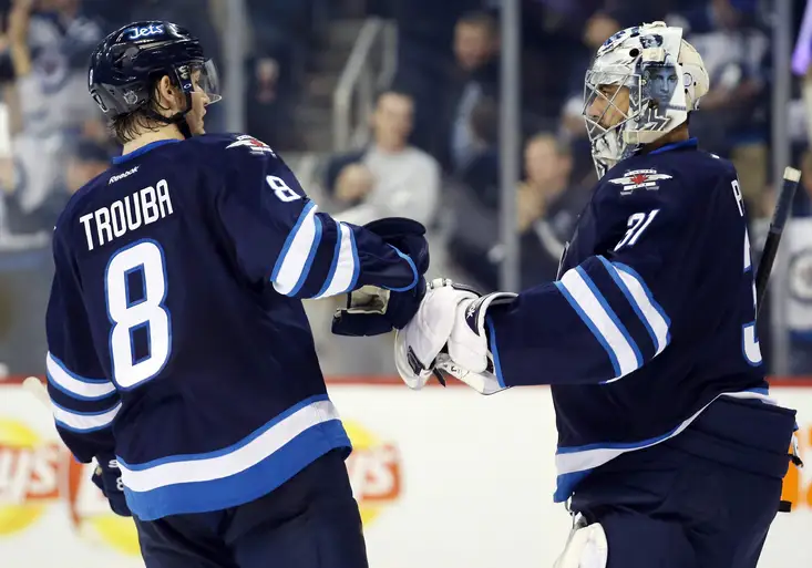 NHL: Pavelec vychytal výhru nad Calgary, Hertl pomohl San José k dalšímu vítězství