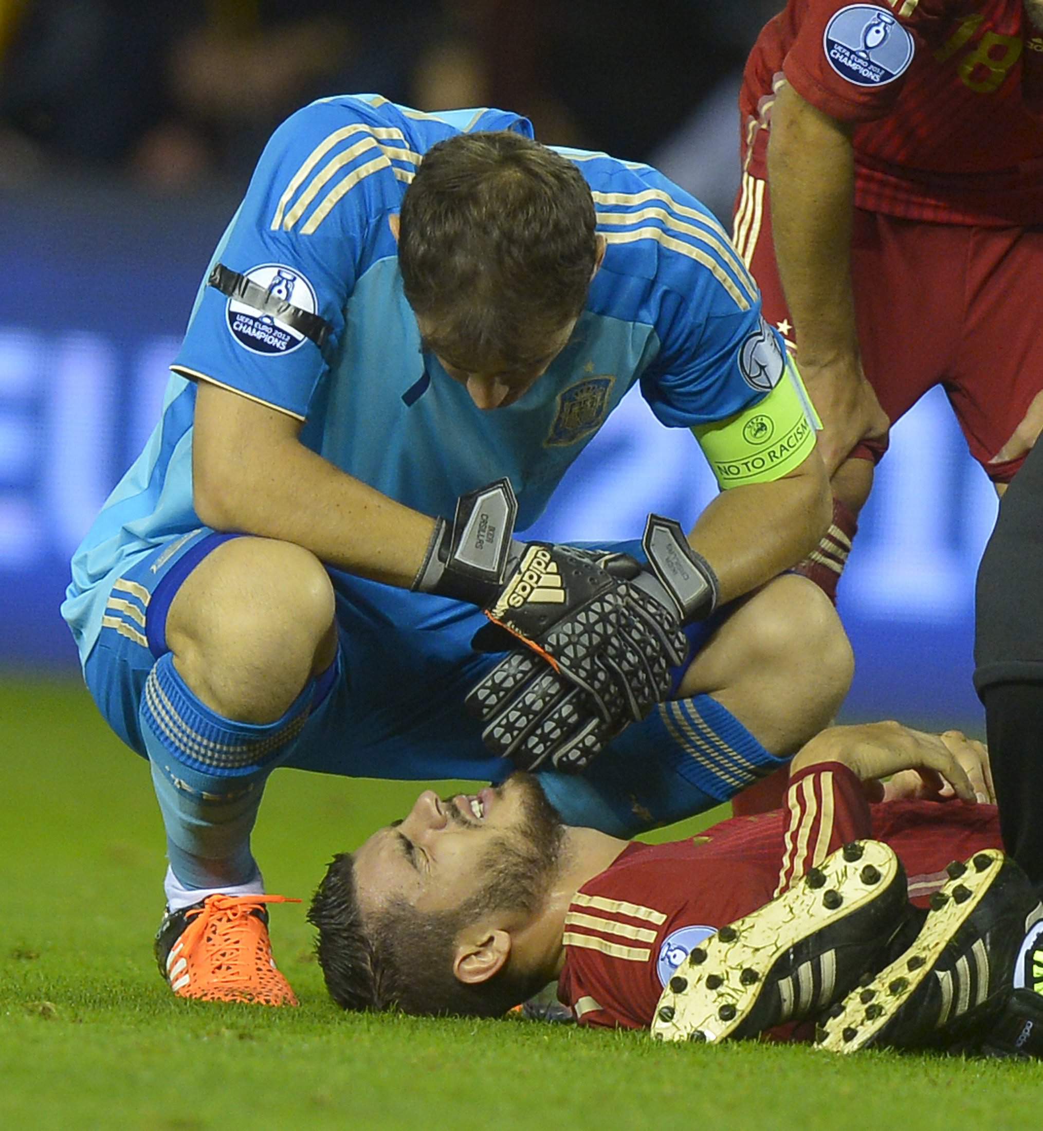 Spain's Iker Casillas (L) talks to Alvaro Morata, injured during their Euro 2016 Group C qualification soccer match against Luxembourg in Logrono, Spain October 9, 2015. REUTERS/Vincent West