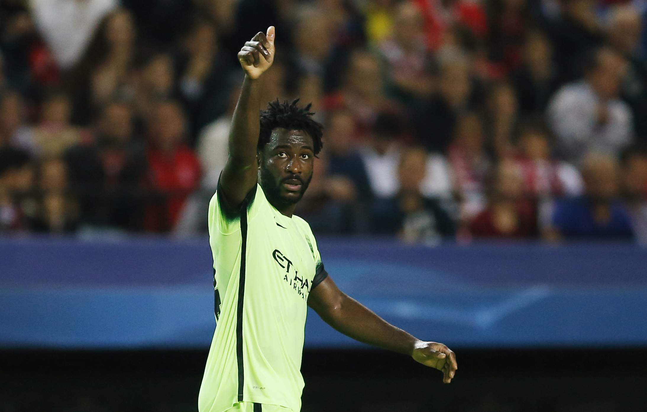 Football - Sevilla v Manchester City - UEFA Champions League Group Stage - Group D - Estadio Sanchez Pizjuan, Sevilla, Spain - 3/11/15 Manchester City's Wilfried Bony celebrates scoring their third goal Action Images via Reuters / Andrew Boyers Livepic EDITORIAL USE ONLY.