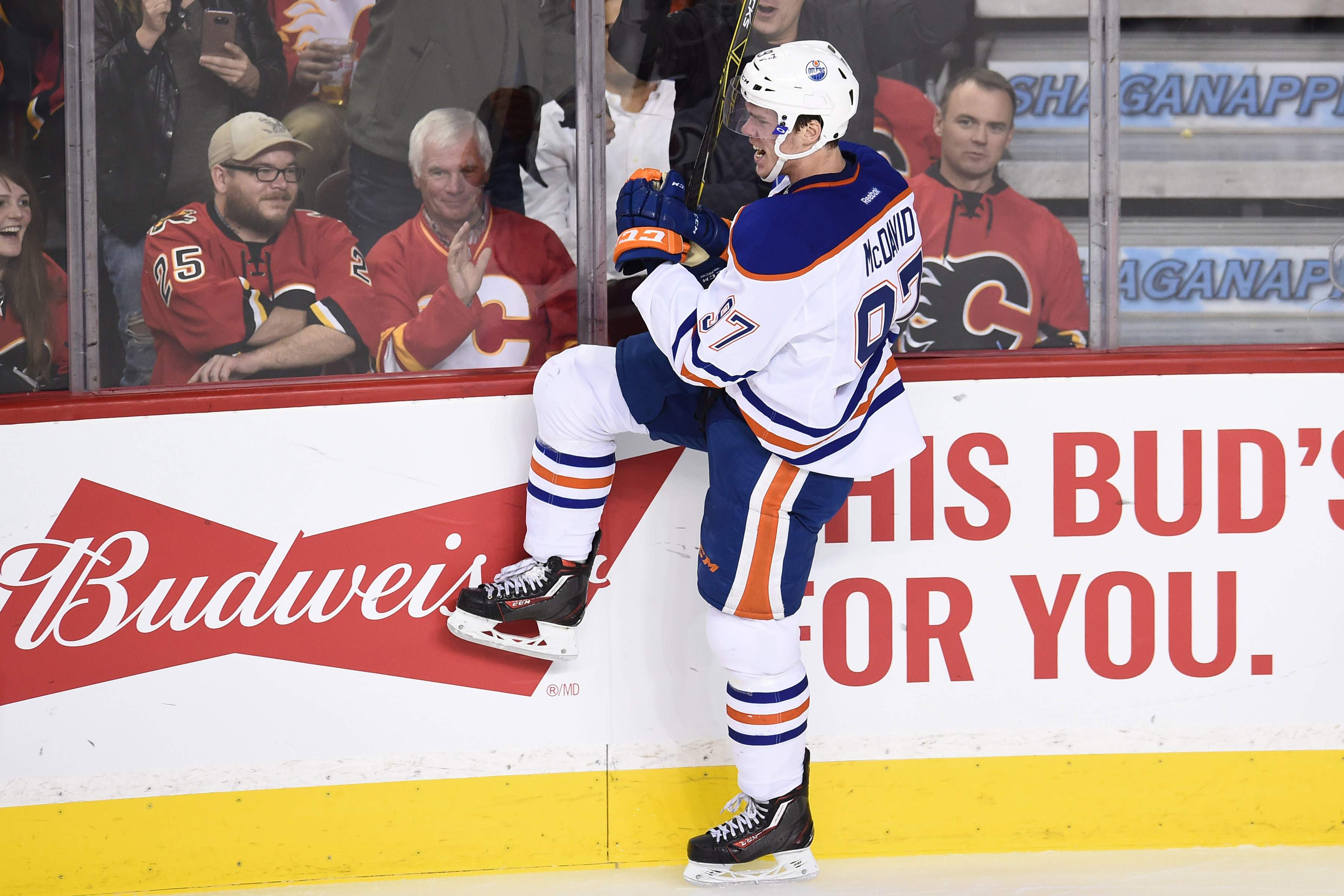 Oct 17, 2015; Calgary, Alberta, CAN; Edmonton Oilers center Connor McDavid (97) celebrates his third period goal against the Calgary Flames at Scotiabank Saddledome. The Oilers won 5-2. Mandatory Credit: Candice Ward-USA TODAY Sports