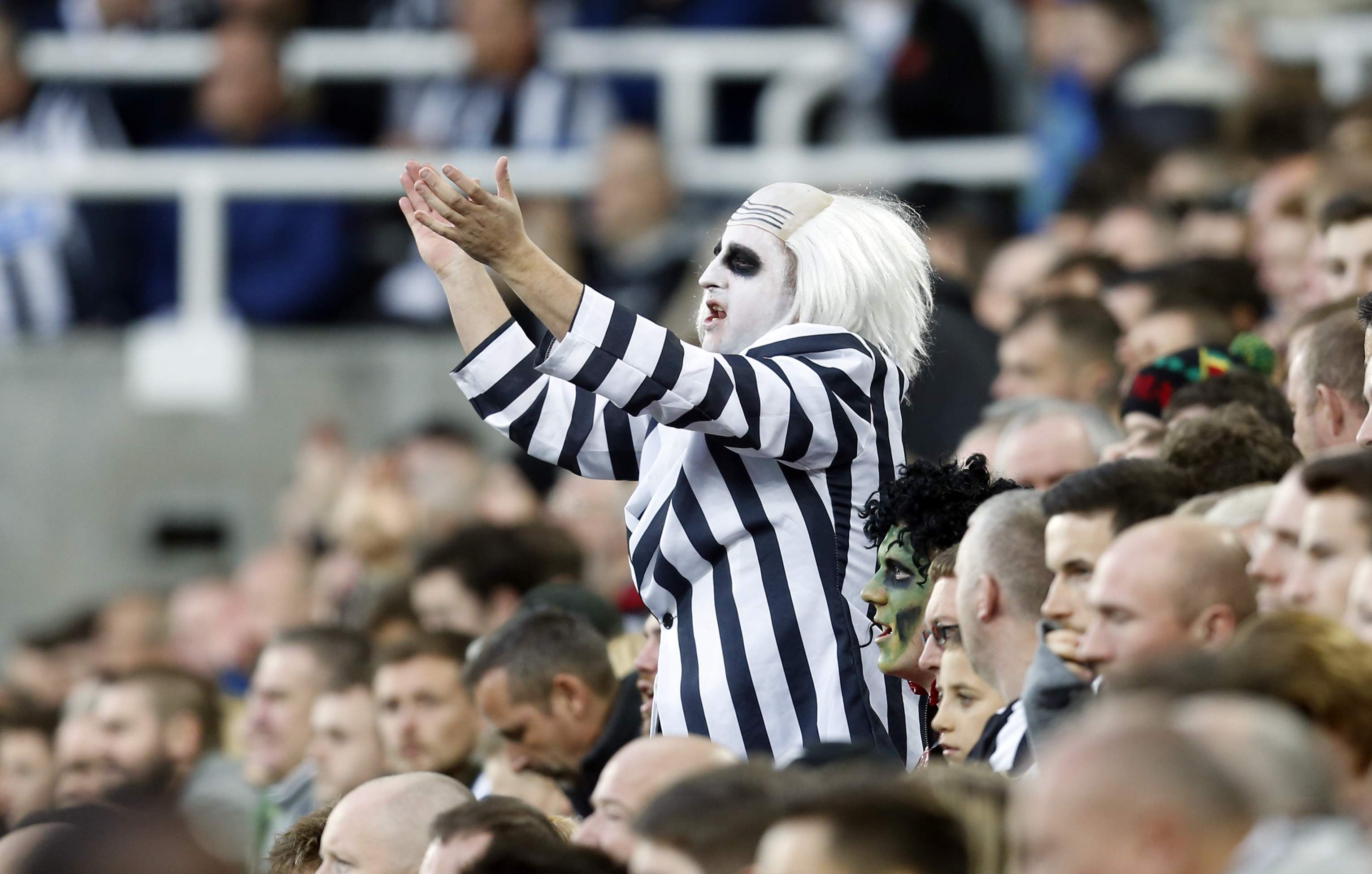 Football - Newcastle United v Stoke City - Barclays Premier League - St James' Park - 31/10/15 Newcastle fans in Halloween fancy dress  Mandatory Credit: Action Images / Ed Sykes Livepic EDITORIAL USE ONLY. No use with unauthorized audio, video, data, fixture lists, club/league logos or "live" services. Online in-match use limited to 45 images, no video emulation. No use in betting, games or single club/league/player publications.  Please contact your account representative for further details.
