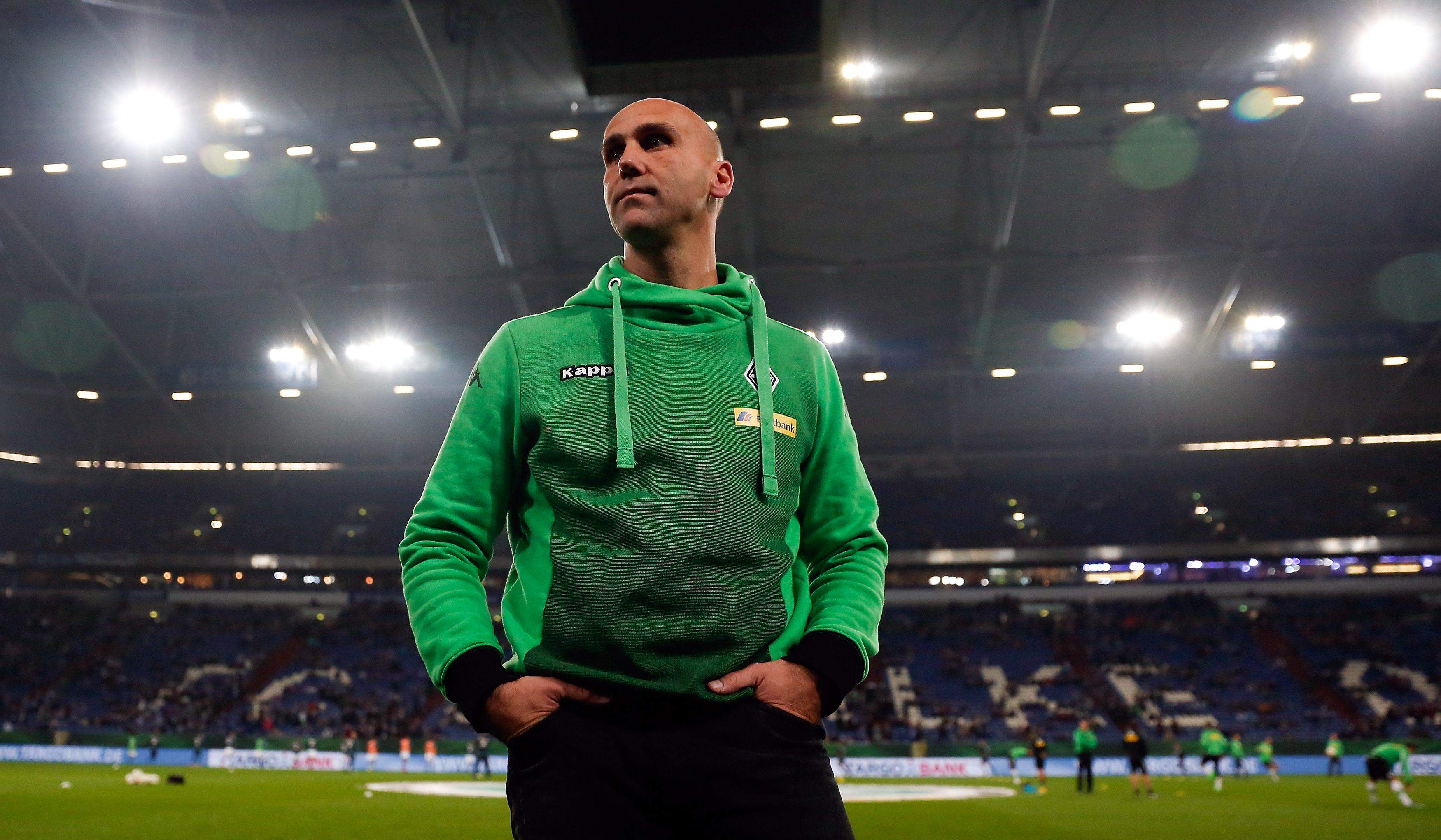 Borussia Moenchengladbach's coach Andre Schubert waits for the start of their German Cup (DFB Pokal) second round soccer match against Schalke 04  in Gelsenkirchen, Germany, October 28, 2015.  REUTERS/Wolfgang Rattay    DFB RULES PROHIBIT USE IN MMS SERVICES VIA HANDHELD DEVICES UNTIL TWO HOURS AFTER A MATCH AND ANY USAGE ON INTERNET OR ONLINE MEDIA SIMULATING VIDEO FOOTAGE DURING THE MATCH.