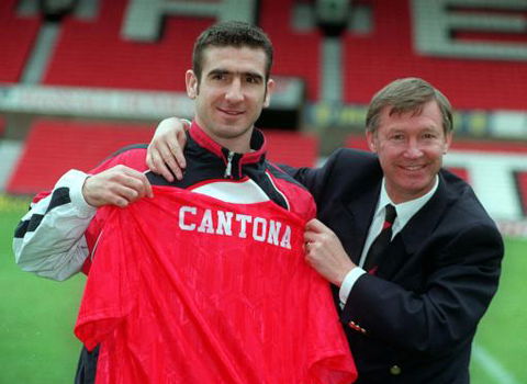 27th NOVEMBER : On this day in 1992 Manchester United's manager, Alex Ferguson unveiled their new signing, Eric Cantona. Manchester United's  1.2 million new signing from Leeds United Eric Cantona (left), pictured at their Old Trafford ground, in Manchester, with the team's manager Alex Ferguson.