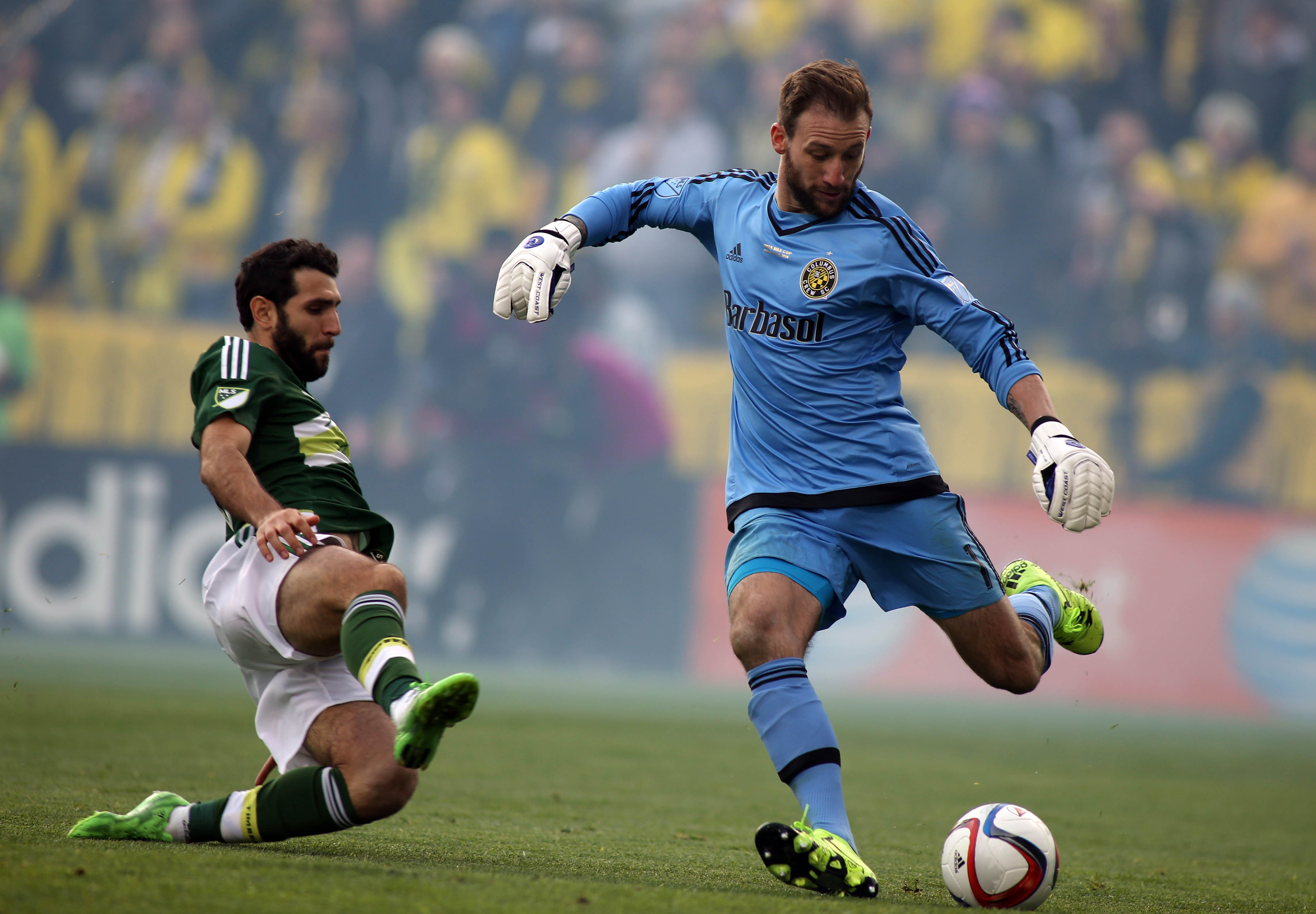 Dec 6, 2015; Columbus, OH, USA; Columbus Crew goalkeeper Steve Clark (1) is unable to clear the ball allowing Portland Timbers midfielder Diego Valeri (8) to score a goal during the first half in the 2015 MLS Cup championship game at MAPFRE Stadium. Mandatory Credit: Trevor Ruszkowksi-USA TODAY Sports