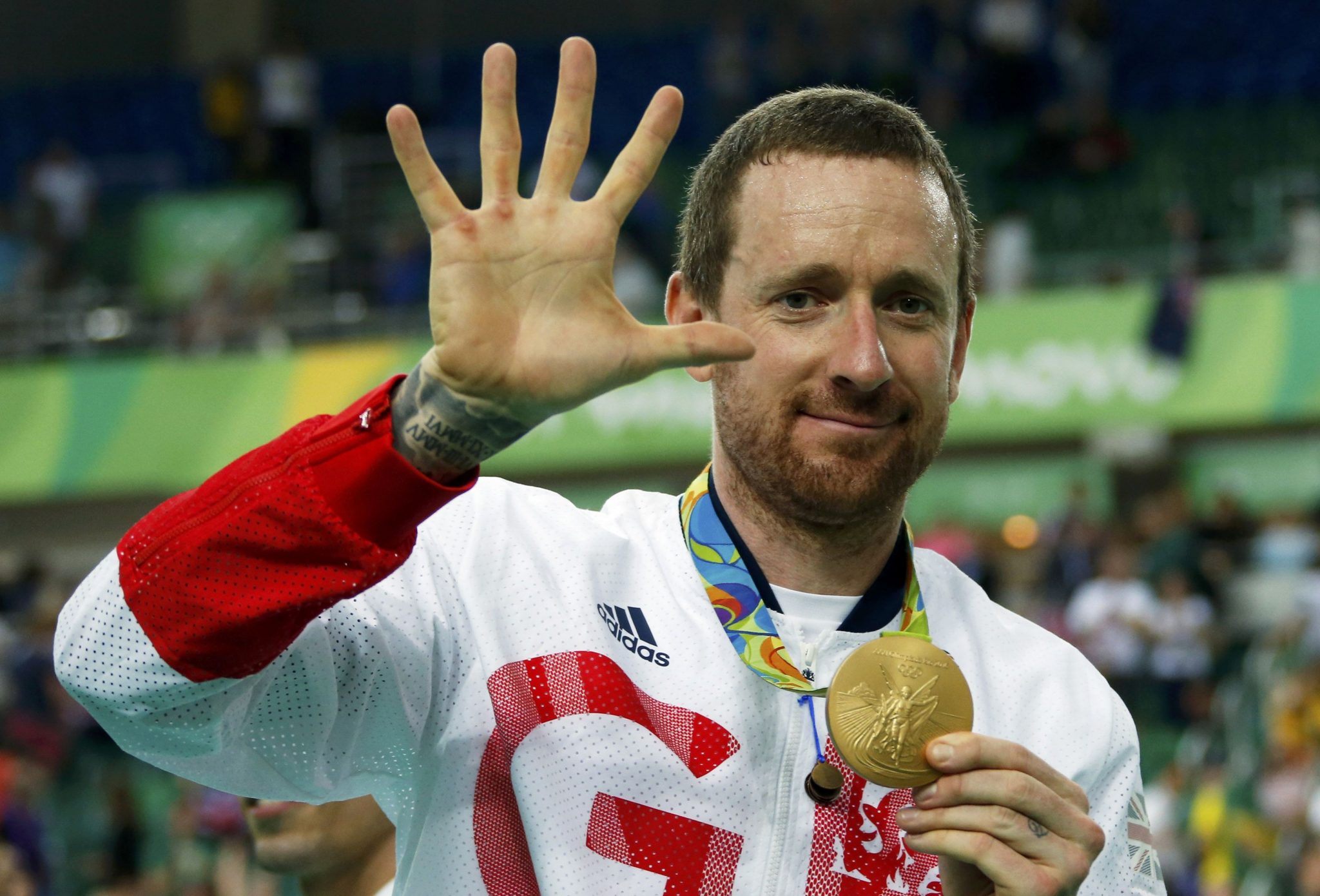 2016 Rio Olympics - Cycling Track - Victory Ceremony - Men's Team Pursuit Victory Ceremony - Rio Olympic Velodrome - Rio de Janeiro, Brazil - 12/08/2016. Bradley Wiggins (GBR) of Britain poses with his gold medal. REUTERSEric Gaillard TPX IMAGES OF THE DAY. FOR EDITORIAL USE ONLY. NOT FOR SALE FOR MARKETING OR ADVERTISING CAMPAIGNS.